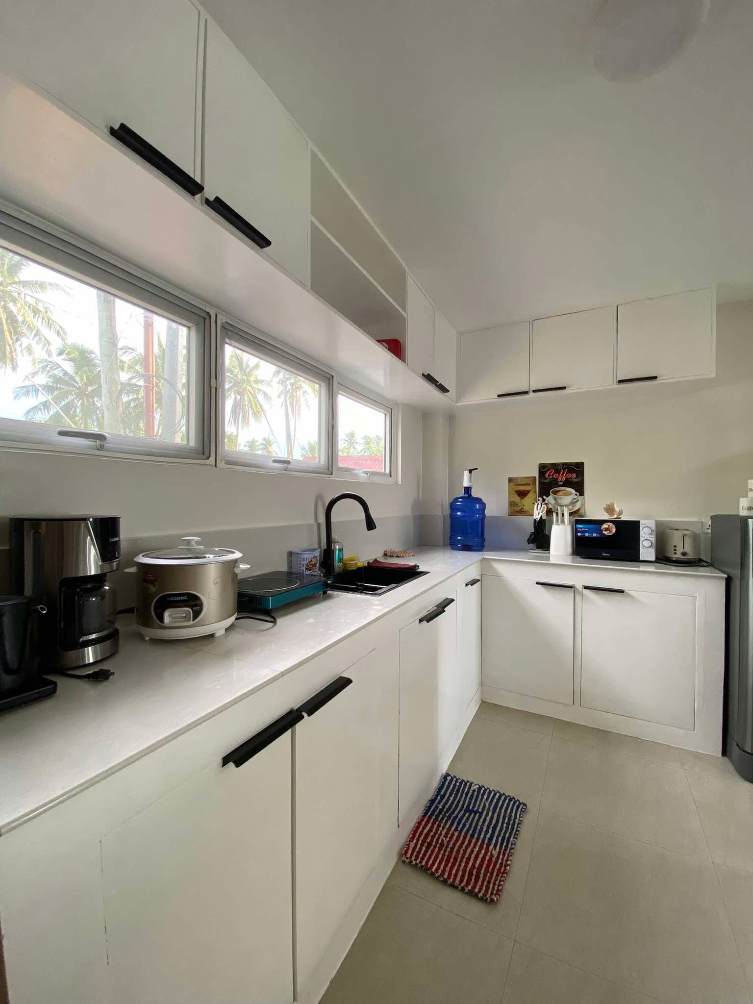 Fully equipped white kitchen