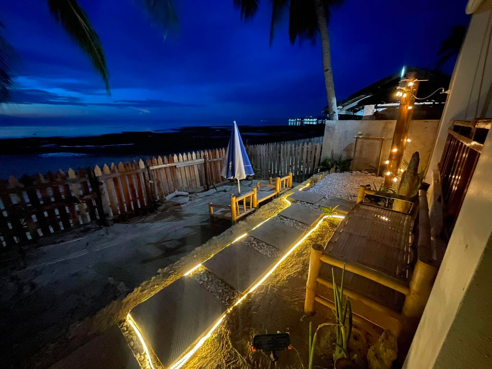 Beachfront garden during blue hour